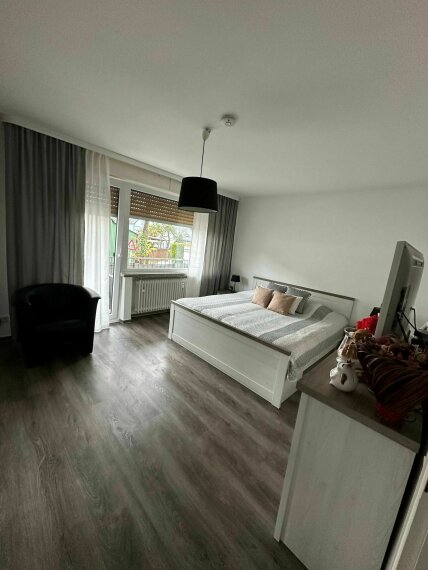 Schlafzimmer mit Balkon