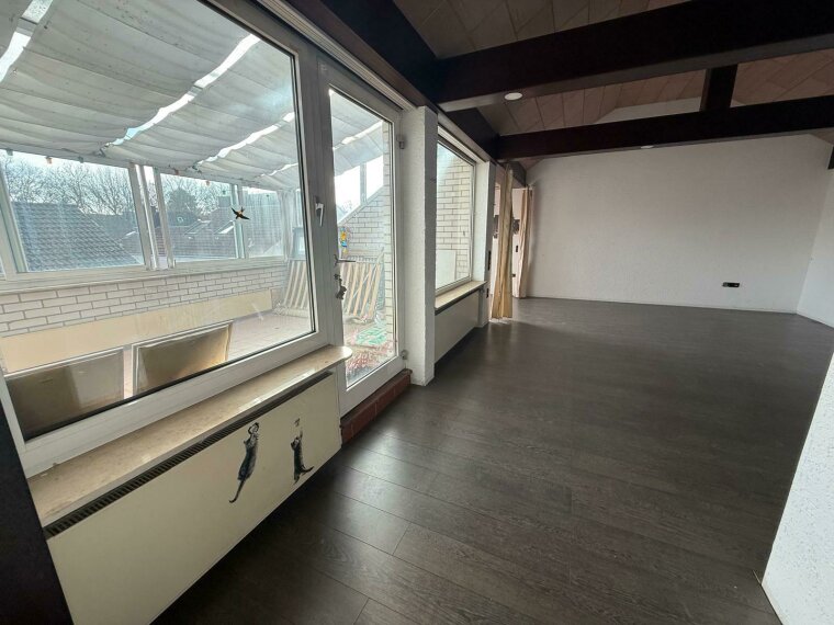 Wohnzimmer mit Wintergarten