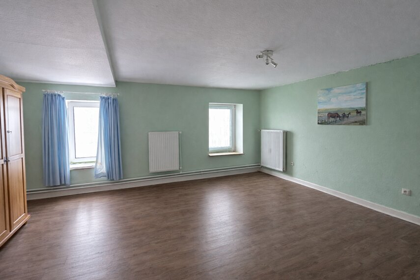 DG Whg Wohnhaus- helles Wohzimmer