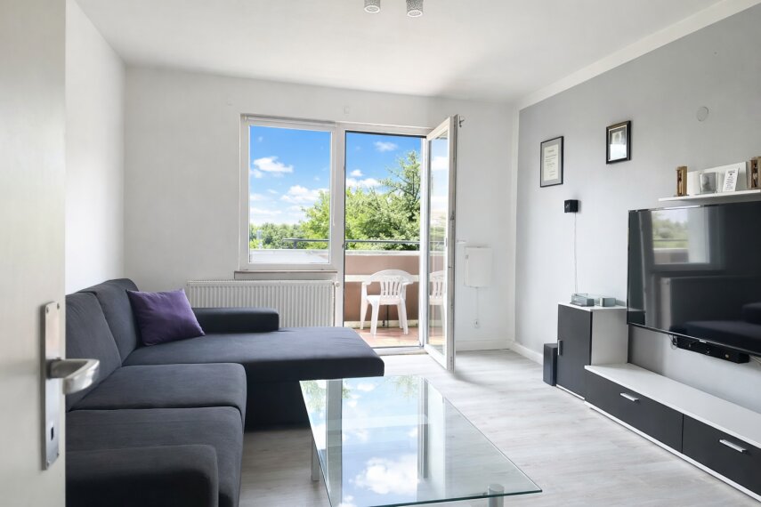 Wohnzimmer mit Balkon