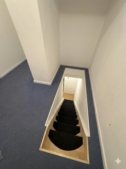 Treppe zum Dachgeschoss