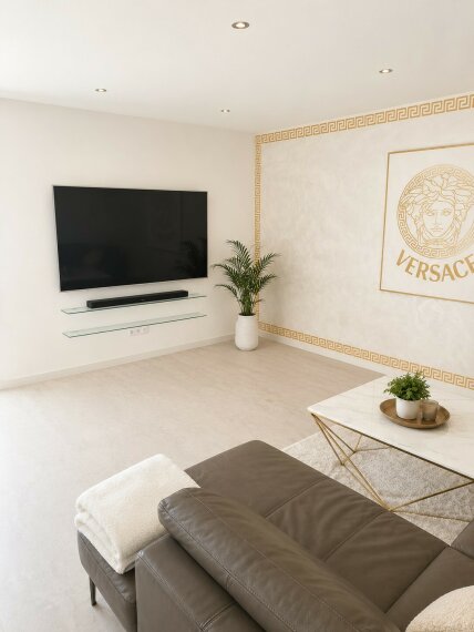 Wohnzimmer mit Fernseher